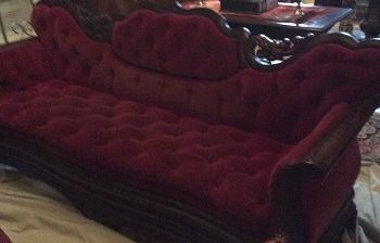UPHOLSTERY WITH WOODWORK, BUTTONS, AND VELVET CONSTRUCTION WILL TAKE MUCH LONGER TO CLEAN THAN A STANDARD SOFA.