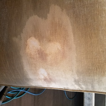 THIS IS THE RESULT OF A CUSTOMER WHO ATTEMPTED TO SPOT CLEAN A RAYON VELVET FABRIC