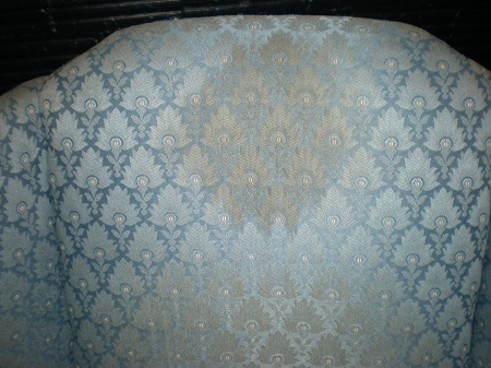 USE SOLVENT AND&##x2f;OR OXIDIZING BOOSTERS TO REMOVE STUBBORN HAIR OIL STAINS LIKE THIS