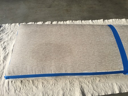 This delicate fabric has a stubborn wine stain that must be removed without damaging the texture-